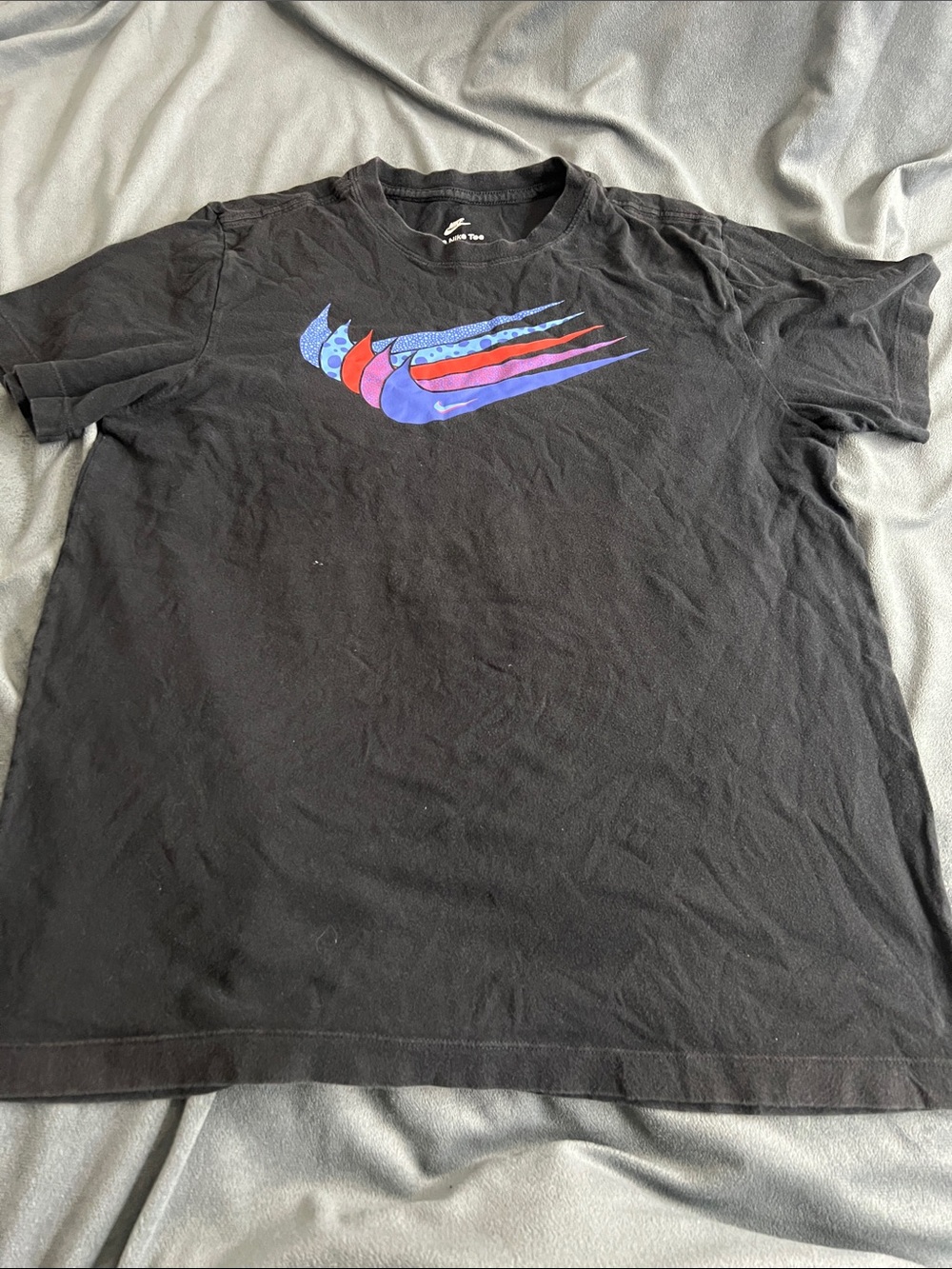 Nike Black Short-Sleeve Tee with Blue and Red Swoosh Graphic